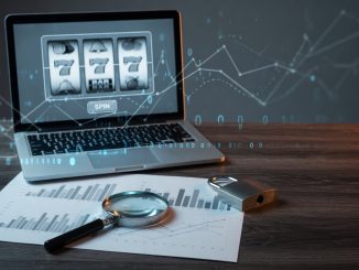 Moody blue-lit photo of a laptop showing slot reels, with a magnifying glass over